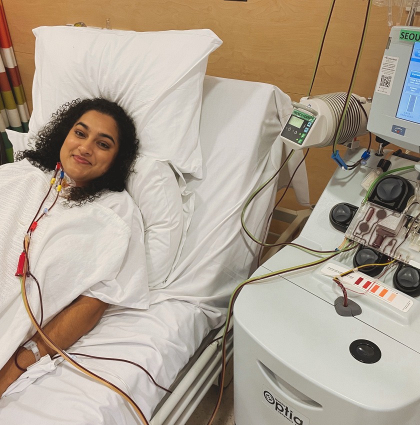 Female patient laying in a hospital bed